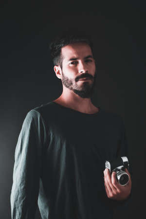 studio session with model and retro vintage cameraの写真素材