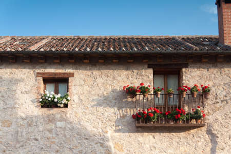 An old flowery window in Pedraza, Segovia  Spain の写真素材
