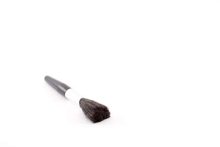 An isolated make-up brush