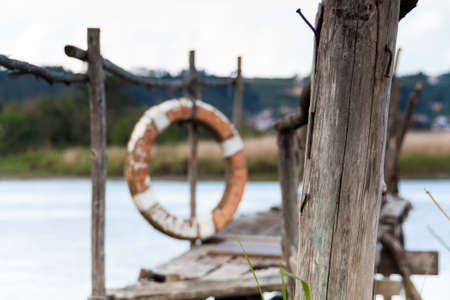 A gangway over the water with a lifebuoy at the background in Asturias  Spain の写真素材