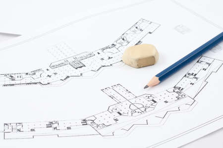 Design drawings, a pencil and rubber eraser