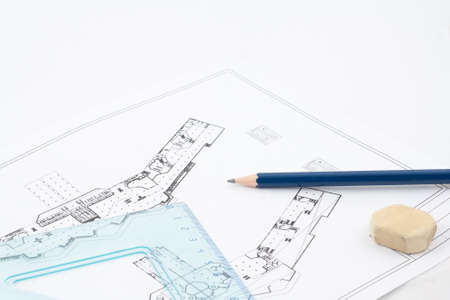 Design drawings, a pencil, a rubber eraser and a set squareの写真素材