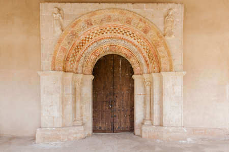 Old church door of Our Lady of the Vegas (Nuestra Sra de Las Vegas), Segovia (Spain)の写真素材