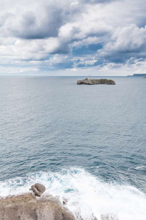 A lighthouse in the Mouro Island, Santander  Spain の写真素材