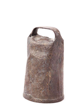 Old and rusty cowbell isolated on white backgroundの写真素材