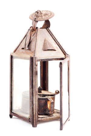 Old rusty oil lamp isolated on white backgroundの写真素材