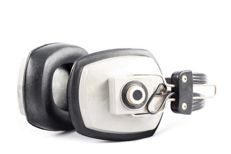 Old headphones isolated on a white backgroundの写真素材