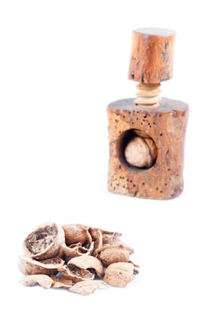 Nutshells and nutcracker isolatedの写真素材