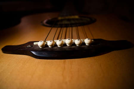 Detail of classic guitar with shallow depth of field, One of the instruments played with the passageの写真素材