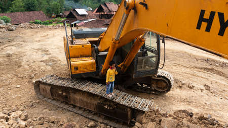 Excavators at the mine site. The process of dredging mining materials to be processed into building...
