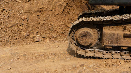Excavator wheels with ground attached. The maintenance process is needed for better performance