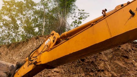 Excavators at the mine site. The process of dredging mining materials to be processed into building...