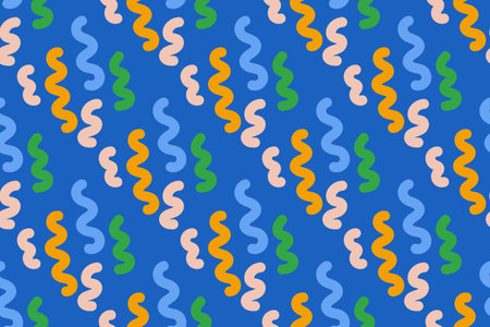 Seamless pattern with colorful curly ribbons on a blue background