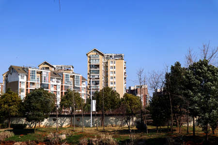 The houses along the river are all built and ready for sale by construction developersの写真素材