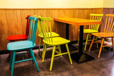 Here are the tables and chairs in the cafeの写真素材