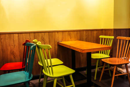 Here are the tables and chairs in the cafeの写真素材