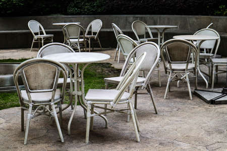 Here are the tables and chairs in the cafeの写真素材