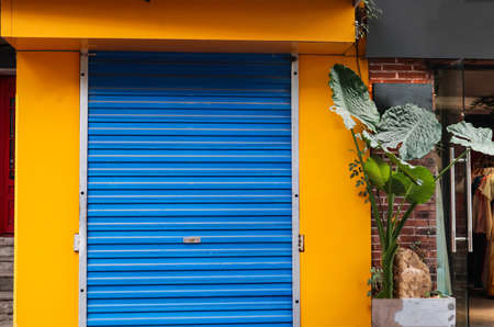 small shop with a closed door