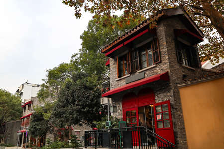old building in a business district in Chinaのeditorial素材
