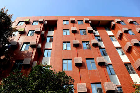 This red building is an office building in a Chinese cityの写真素材