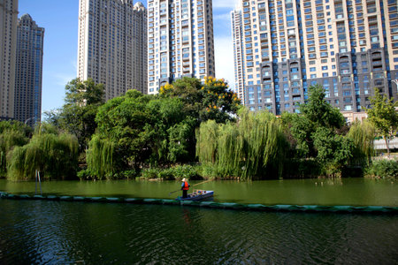 Under the blue sky, these modern skyscrapers are apartments and offices in a Chinese cityの写真素材