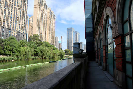 Under the blue sky, these modern skyscrapers are apartments and offices in a Chinese cityの写真素材