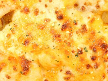 Close-up detail of cheese pizza.  Nice detail.の写真素材