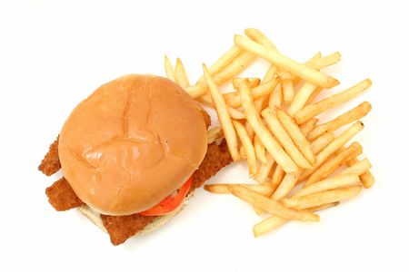 Close-up of a fried fish sandwich and fries.