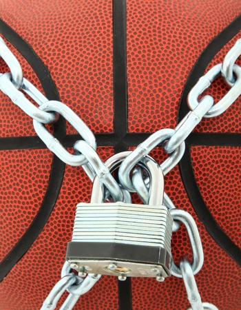 Closeup Of Basketball With Chain Link and Padlockの写真素材