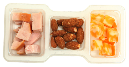 Three piece protien snack pack with salted almonds, smoked turkey and marble cheddar cheese.の写真素材
