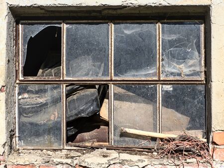 Old broken windowの写真素材