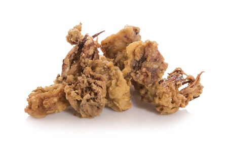 Fried chopitos, typical Spanish food, isolated on white with reflection.