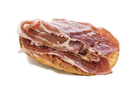 Mollete with jam?n ib? ? rico and tomato, typical spanish food, isolated on white background.の写真素材