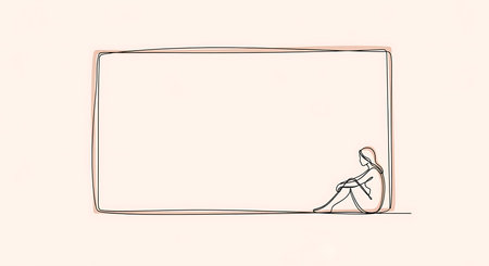 Figurine of a man sitting on a white sheet of paperの素材