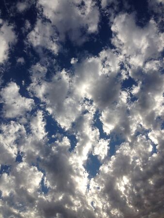 Fluffy clouds on blue skyの素材