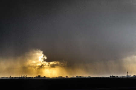 Eerie Sky over Friesland during the early evening. sunset.の写真素材