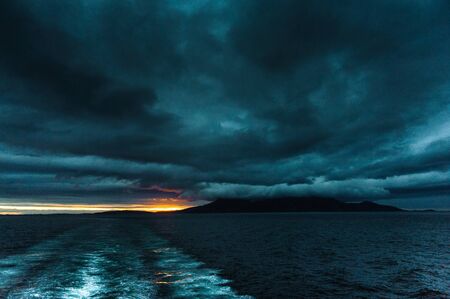 Dark sky and sea.の写真素材