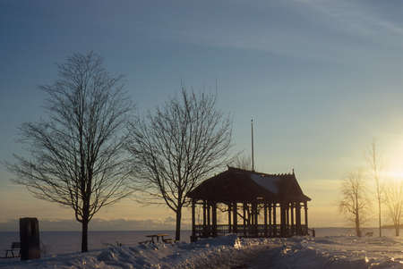 An Arbor near a frozen Lake Ontario, near Kingston, On, Canada in Februariの写真素材