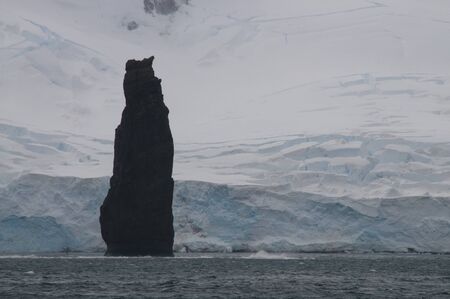 The Astrolabes Needle is a 50 meter tall monolith off the coast of Brabant island,の写真素材