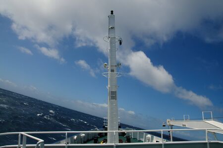 Big waves rolling a ship aside. Enroute between the Falklands and South Georgiaの写真素材