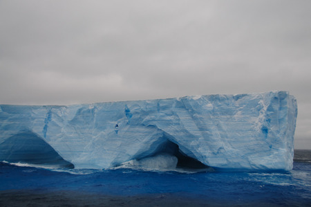 A large tabular iceberg floating in the southern atlantic ocean, near Antarctica.の写真素材