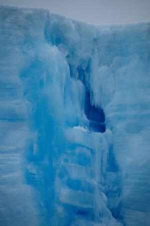 A large tabular iceberg floating in the southern atlantic ocean, near Antarctica.の写真素材
