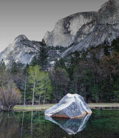 Early moring reflections of the Mountains in Mirror Lake, Yosemite National Park.の写真素材