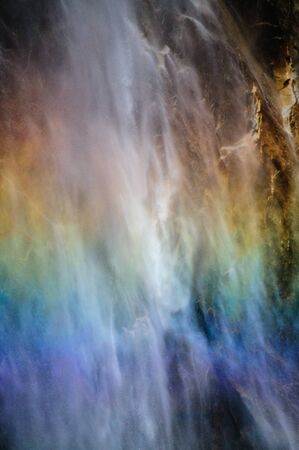 Close-up of a rainbow cast by the upper Yosemite Falls. Yosemite National Park, California, USAの写真素材