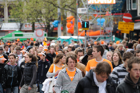 AMSTERDAM, NETHERLANDS - APRIL 30. Young People Celebrating Queensday in Amsterdam. Queensday is a popular annual festival celebrating the Queens Birthday.のeditorial素材