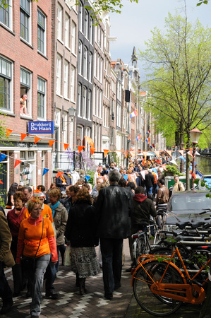 AMSTERDAM, NETHERLANDS - APRIL 30. Young People Celebrating Queensday in Amsterdam. Queensday is a popular annual festival celebrating the Queens Birthday.のeditorial素材