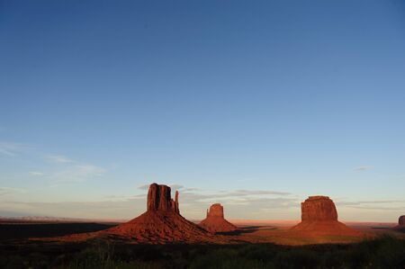 Classic rock formations known as Buttes in Monument Valley in Arizona  during sunset.の写真素材