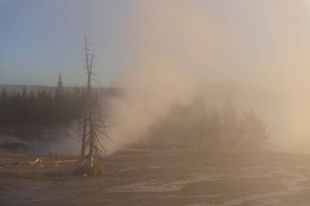 A sunrise in the West Thumb Area in Yellowstone National Parkの写真素材