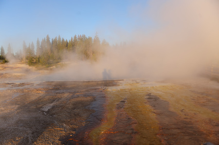 A sunrise in the West Thumb Area in Yellowstone National Parkの写真素材