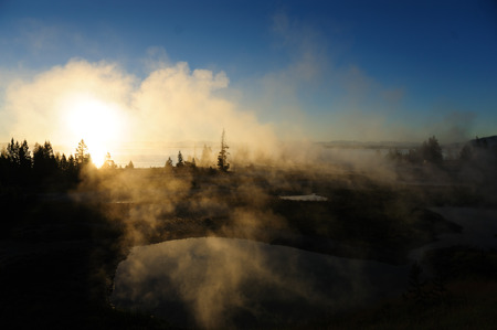 A sunrise in the West Thumb Area in Yellowstone National Parkの写真素材